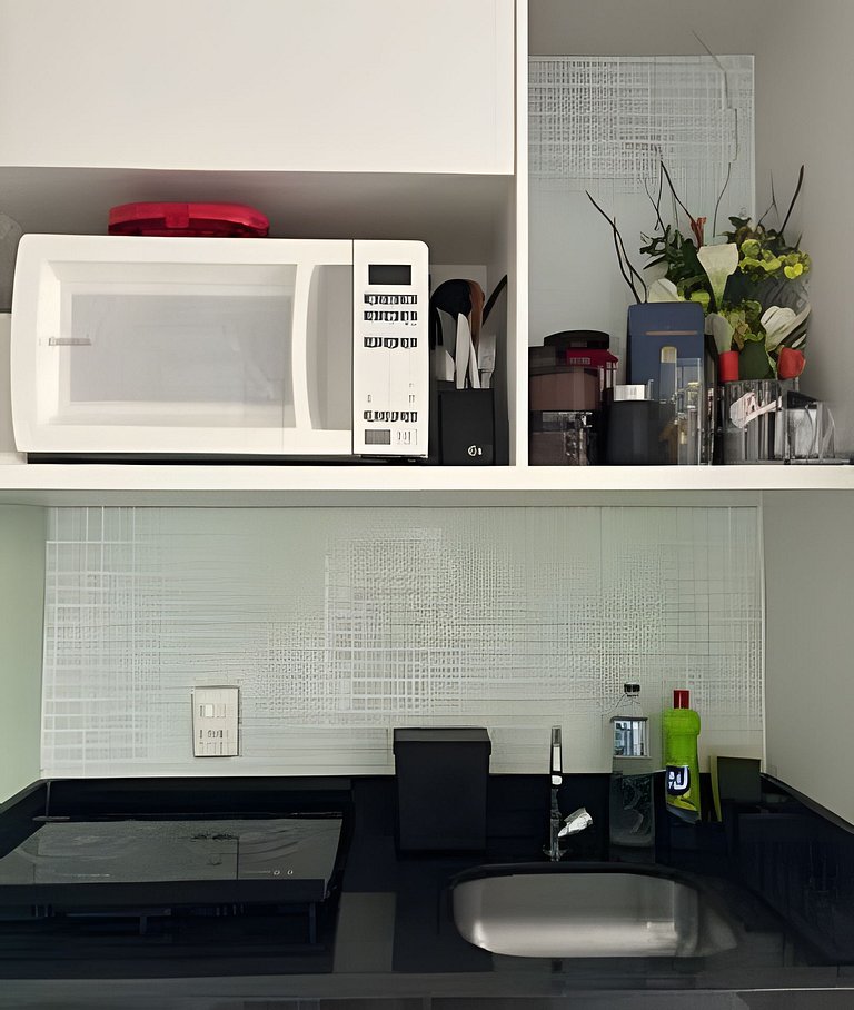 Flat Hotel The Palace com cozinha e sacada