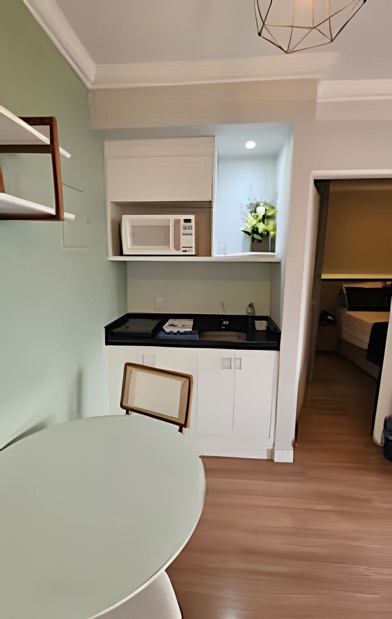 Flat Hotel The Palace com cozinha e sacada