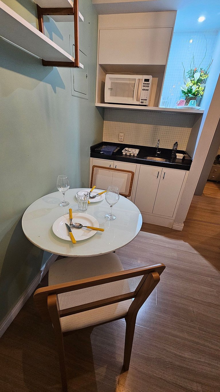 Flat Hotel The Palace com cozinha e sacada